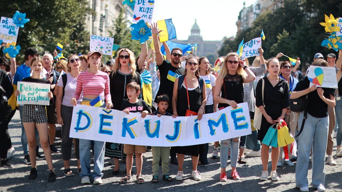 People protest, showing support for ukraine.